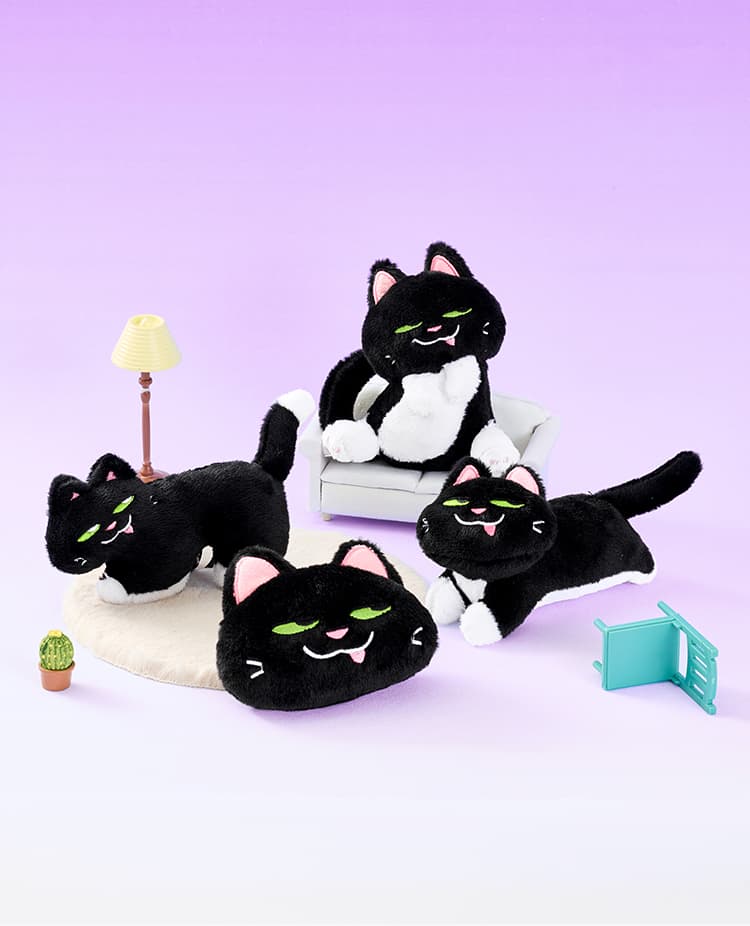 猫ぬいぐるみ 妖艶な瞳の小悪魔ニャンコ