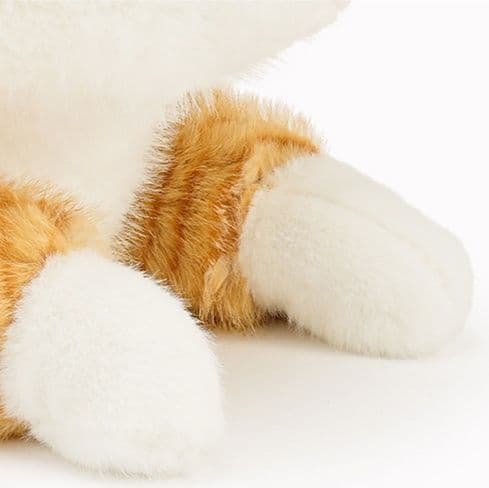 愛らしい瞳のおすわり子猫ぬいぐるみ